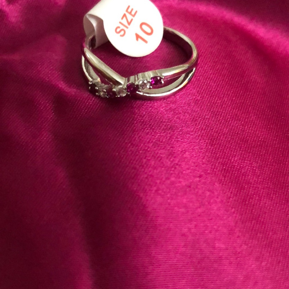 Lab created deep ruby and white topaz ring